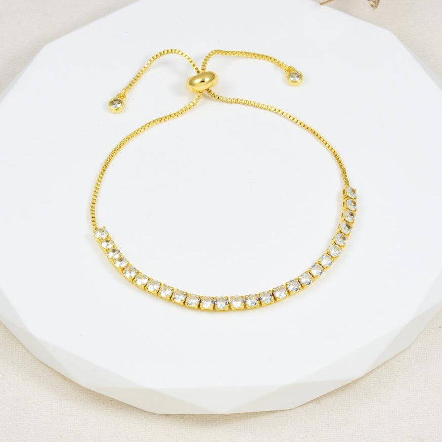 Pulsera de circonitas con cierre corredizo en baño de rodio dorado | Feral